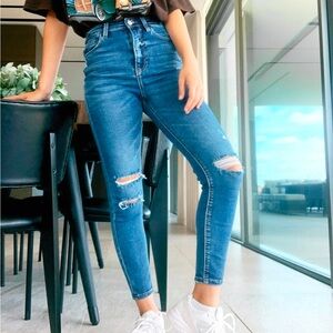 High-Waisted Blue Distressed Jeans